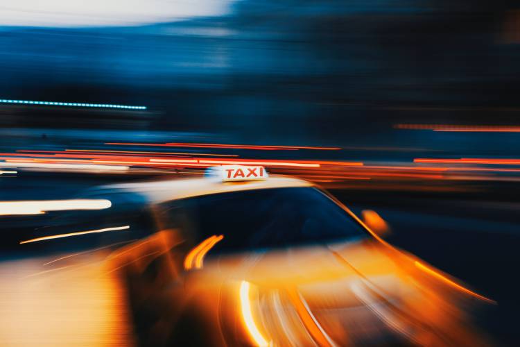 Taxi Photo by Mike Tsitas on Unsplash