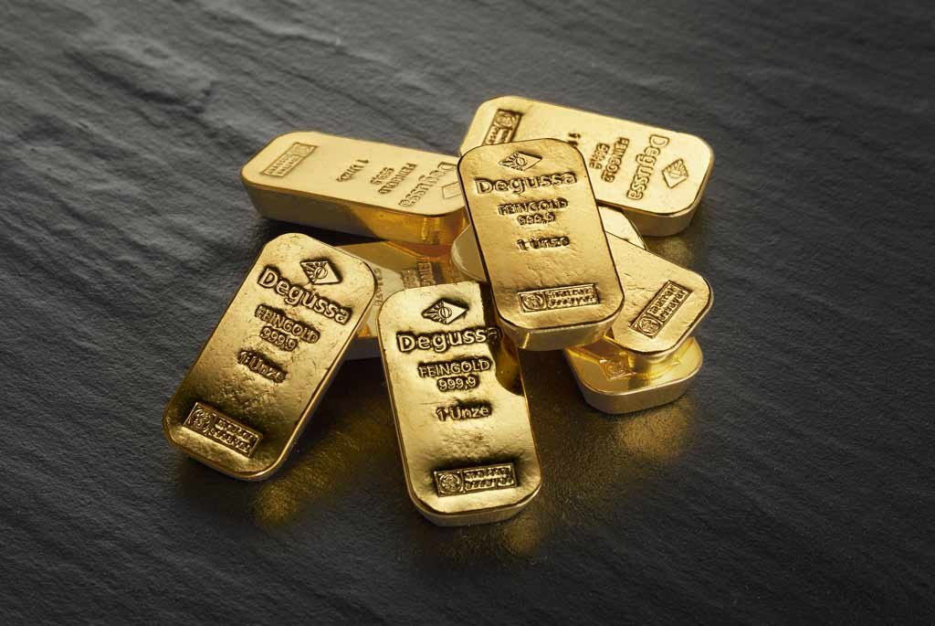 Degussa Goldhandel Goldbarren Haufen